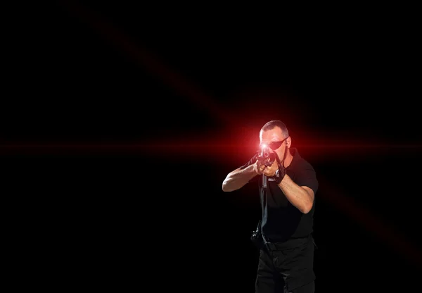 Man aiming assault rifle laser — Stock Photo, Image