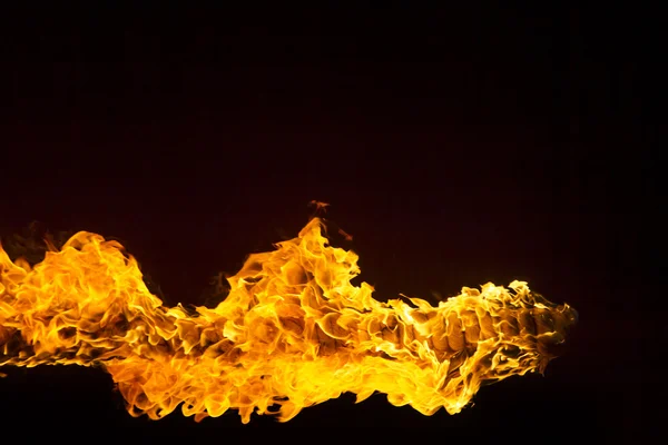 Blazing flames on black background — Stock Photo, Image