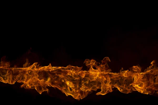 Blazing flames on black background — Stock Photo, Image