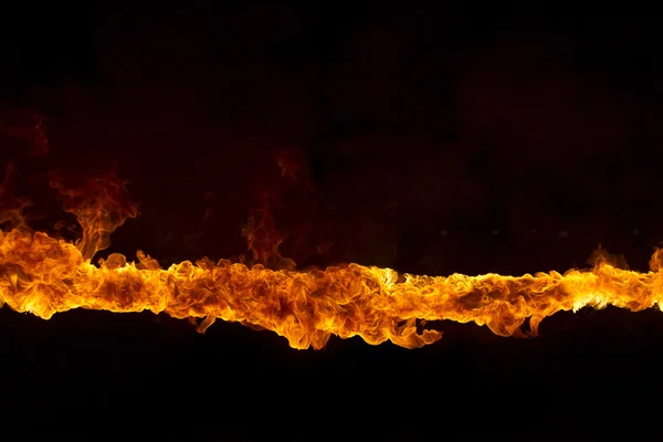 Blazing flames on black background — Stock Photo, Image