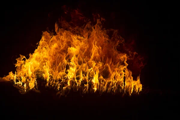 Blazing flames on black background — Stock Photo, Image