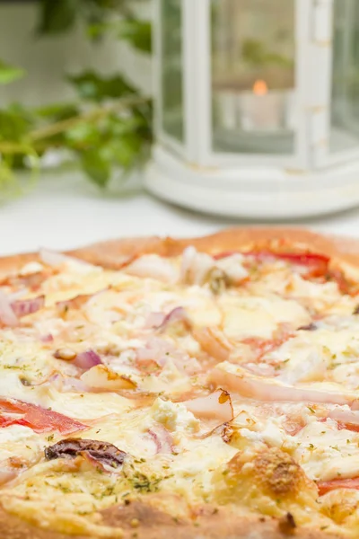 Fresh pizza at the restaurant — Stock Photo, Image