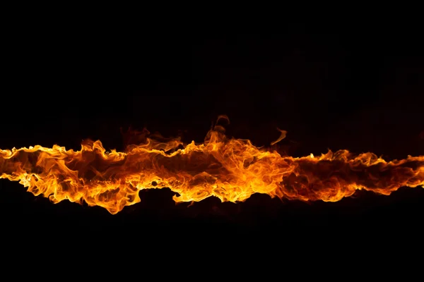 Blazing flames on black background — Stock Photo, Image