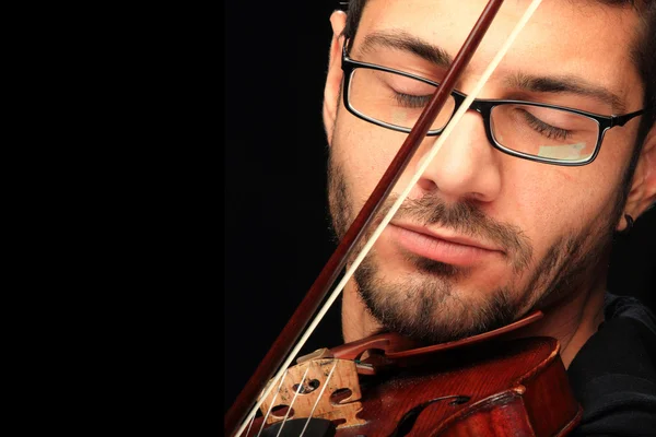 Beautiful lady with handsome man with violin — Stock Photo, Image