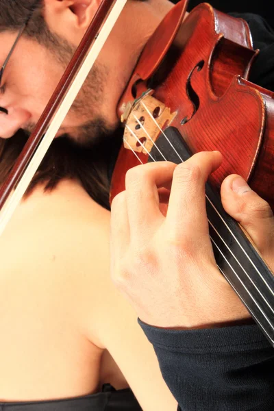 Beautiful lady with handsome man with violin — Stock Photo, Image