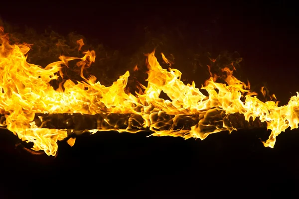 Blazing flames on black background — Stock Photo, Image