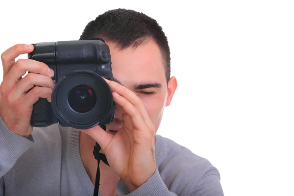 Jovem fotógrafo com câmera, isolado — Fotografia de Stock