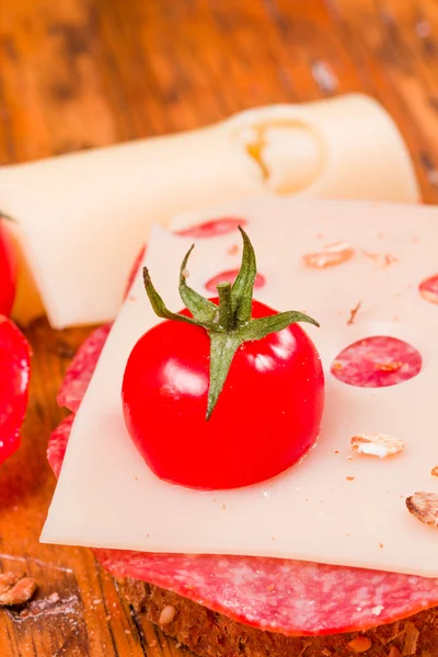 Appetizers with tomatoes and cheese — Stock Photo, Image