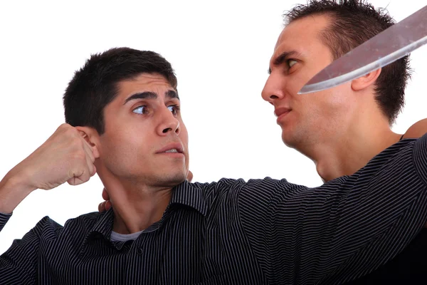 Man defending himself against a knife attack — Stock Image Man defending himself against a knife attack Stock Image