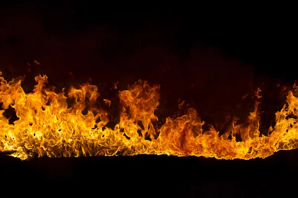 Blazing flames on black background — Stock Photo, Image