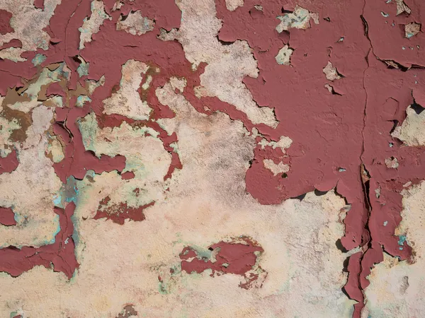 Cracked paint on the concrete wall — Stock Photo, Image