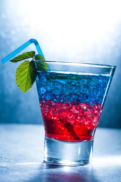 Layered cocktail with blue and red — Stock Photo, Image