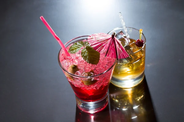 Strawberry cocktail and whiskey liqueur glass — Stock Photo, Image