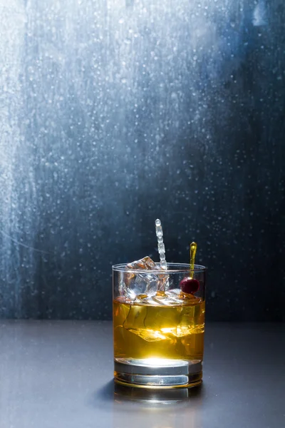 Whisky glass with ice cubes — Stock Photo, Image