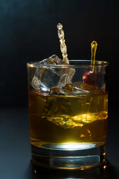 Whisky glass with ice cubes — Stock Photo, Image