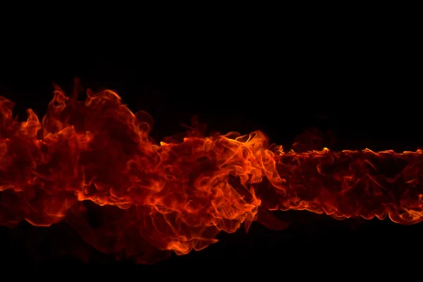 Blazing flames on black background — Stock Photo, Image