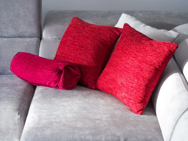 Pillows on couch isolated on white — Stock Photo, Image