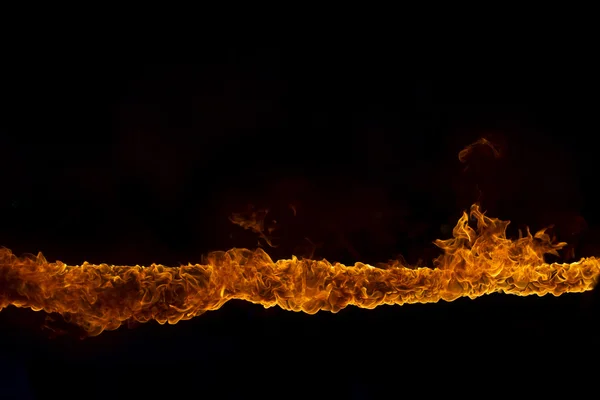 Blazing flames on black background — Stock Photo, Image