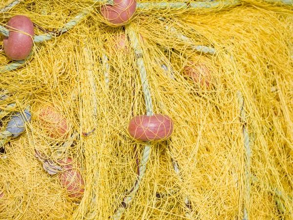 Close-up of fishing net and floats — Stock Photo, Image