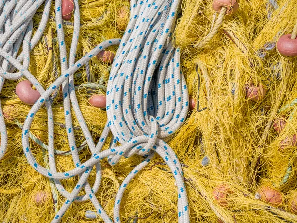 Close-up of fishing net and floats — Stock Photo, Image