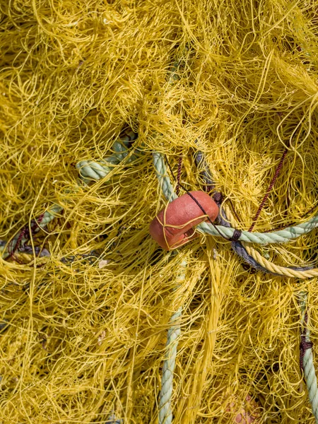 Close-up of fishing net and floats — Stock Photo, Image