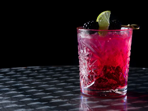 Red cocktail in a whisky glass — Stock Photo, Image