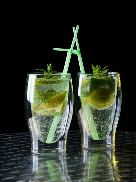 Green cocktail mojito on dark background. — Stock Photo, Image