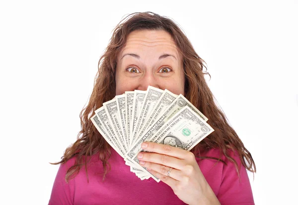 Woman hiding behind money — Stock Photo, Image