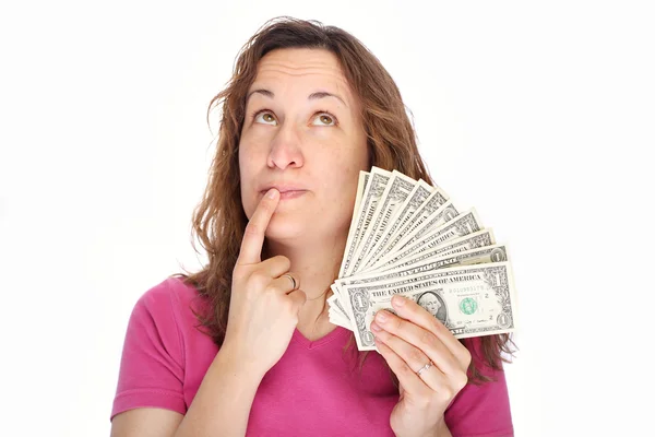 Young thoughtfully woman with money — Stock Photo, Image