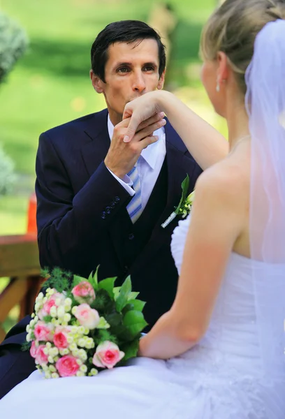 Young groom kissing hand — Stock Photo, Image
