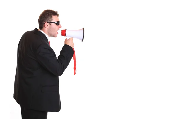 Young businessman with loudspeaker — Stock Photo, Image