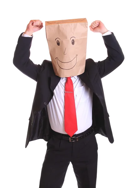 Happy businessman with a paper bag with smile on head — Stock Photo, Image