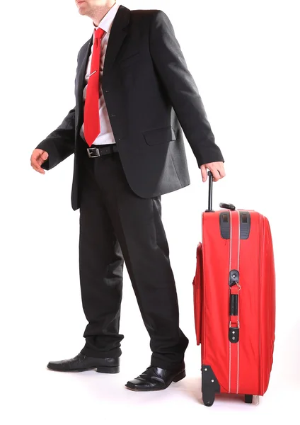 Businessman with suitcase Royalty Free Stock Photos