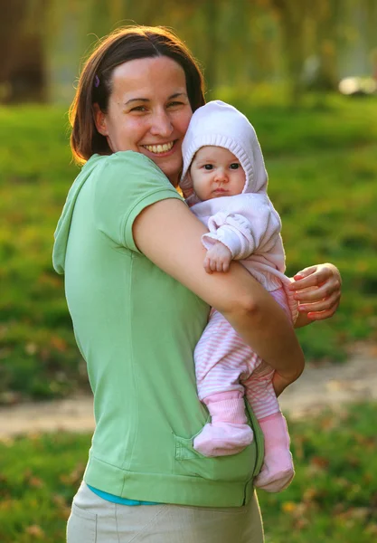 Young woman with her lovely baby — Stock Photo, Image
