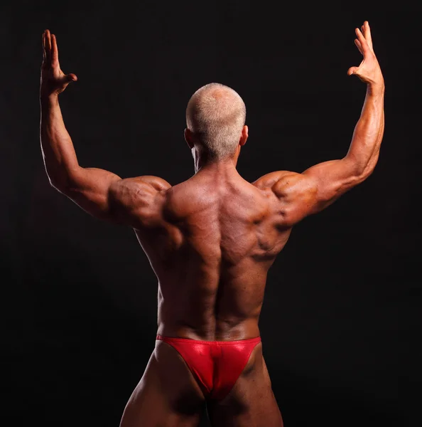 Bodybuilder poseren — Stockfoto