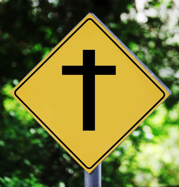 Yellow traffic label with crucifix pictogram — Stock Photo, Image