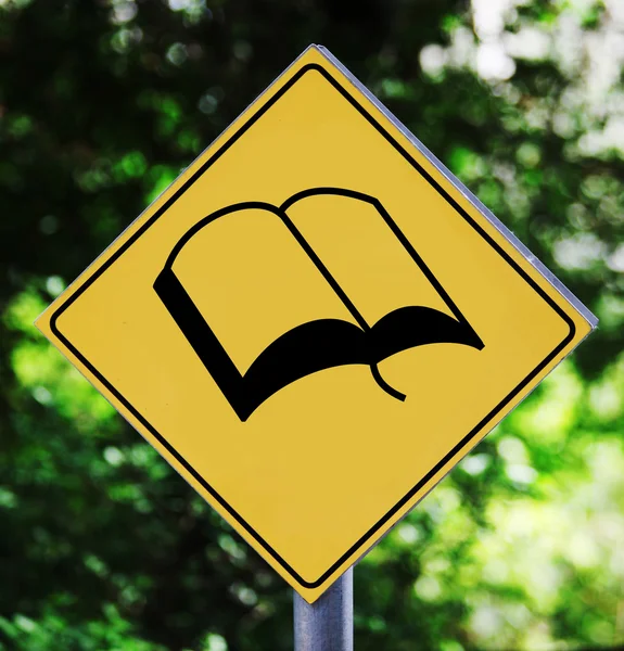 Yellow traffic label with book pictogram — Stock Photo, Image