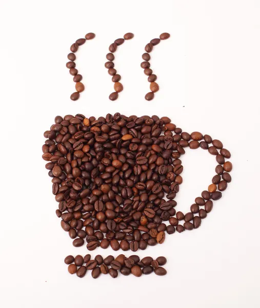 Filiżanka kawy i pary z fasoli — Zdjęcie stockowe