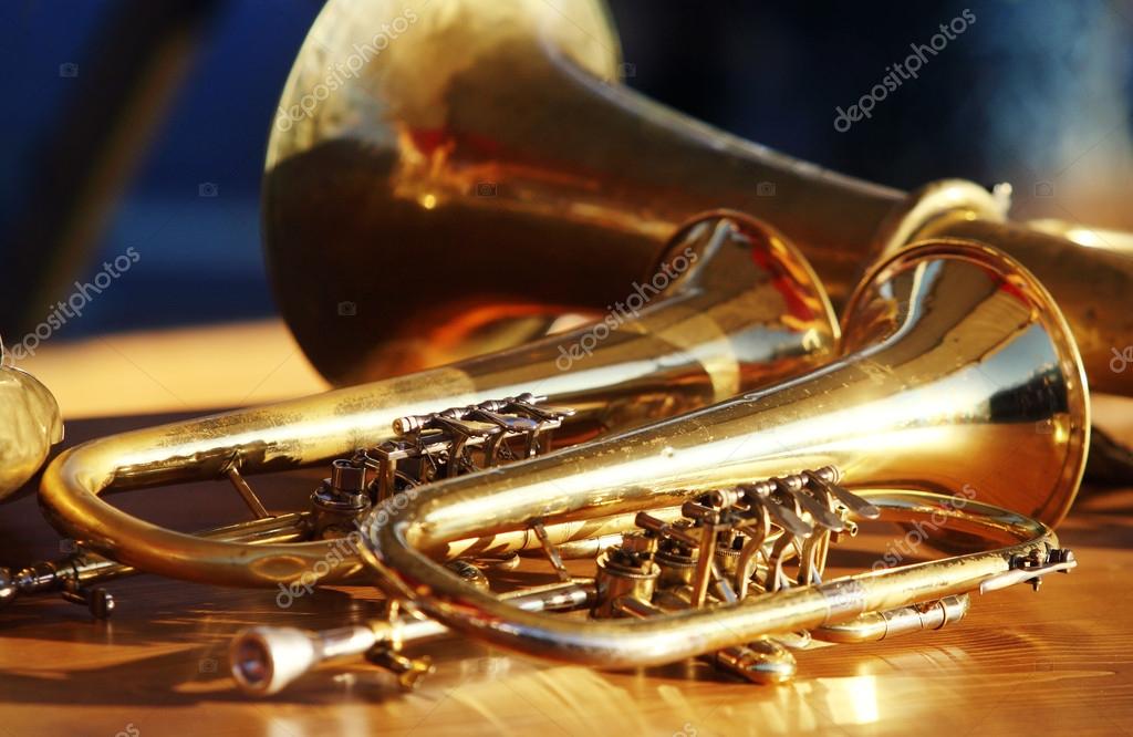 Blowing brass wind instrument on table Stock Photo by ©joruba75 44840961