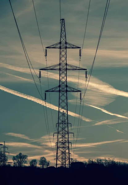 Electric Tower Sunset Contrails — Stock Photo, Image