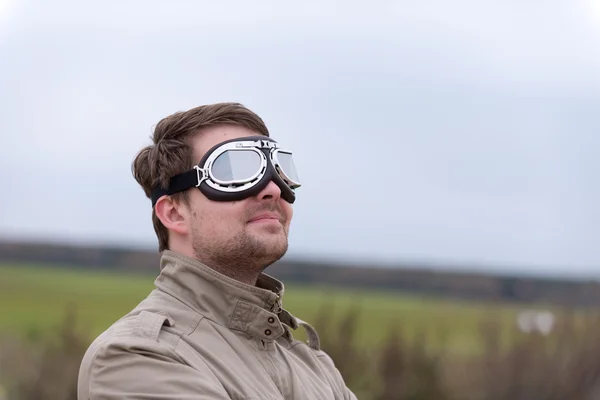 Young man with steampunk aviator goggles — Stock Photo, Image