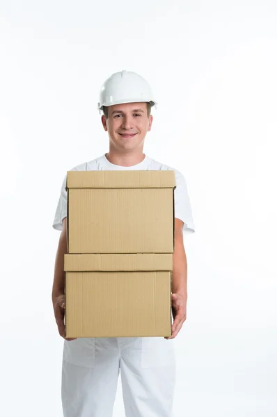 Allegro lavoratore con scatole di cartone — Foto Stock