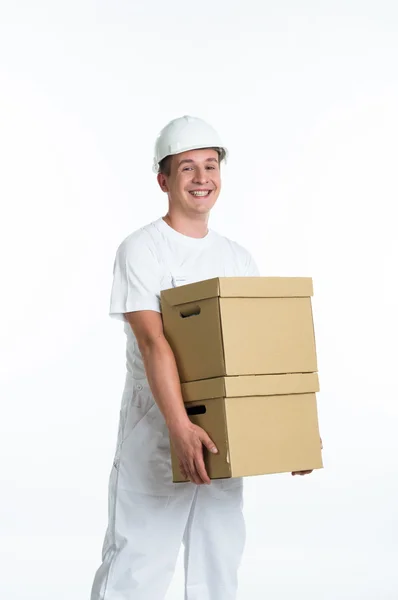 Karton kutular ile neşeli işçi — Stok fotoğraf