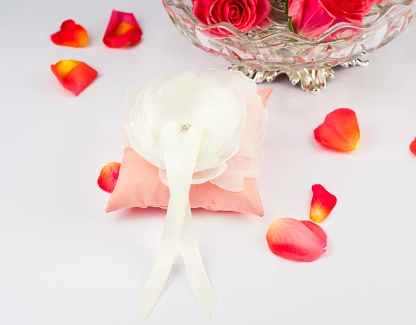 Beautiful pillow for wedding rings with rose petals — Stock Photo, Image