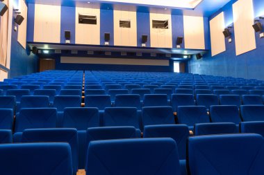 Blue arm-chairs in cinema clipart