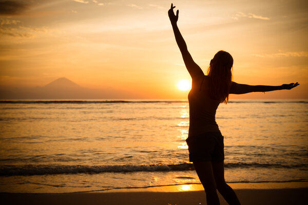 Woman watching sunset