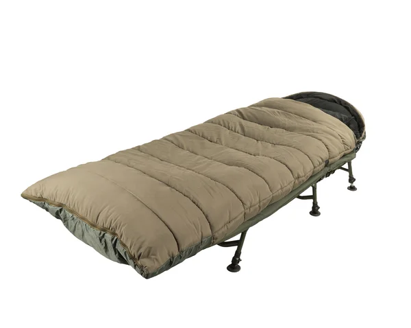 Camp bed with sleeping bag — Stock Photo, Image