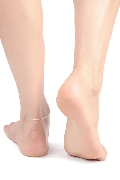 Жінки ноги над білим — стокове фото