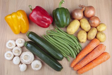 Mixed vegetables on chopping board