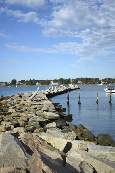 Rock wall by a harbor — Stock Photo, Image